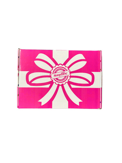 Pink and White box with a BIG Bow from SUNSHINE WITH A BOW on navy leather
